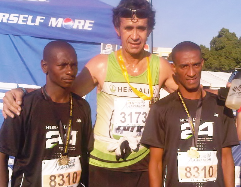 two new runners with coach Hansie after their first 21 km relay race